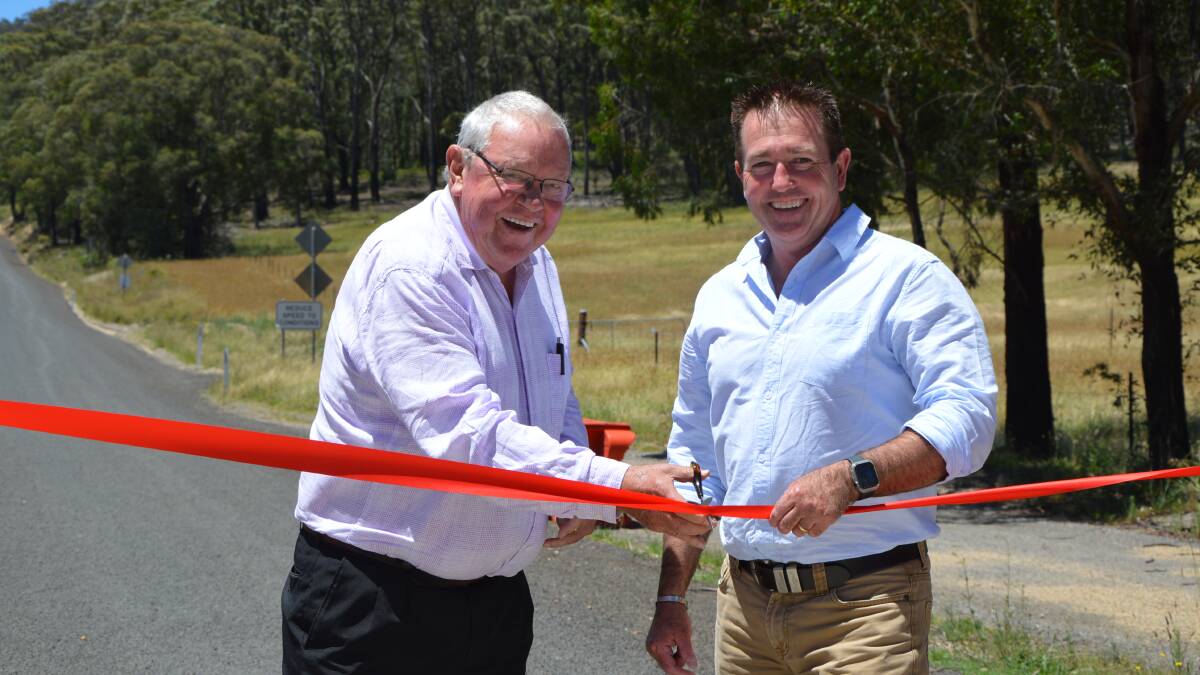 COMPLETE: Lithgow City mayor Cr Ray Thompson and Bathurst MP Paul Toole officially open the new and improved Hartley Vale Road. Photo; ALANNA TOMAZIN.