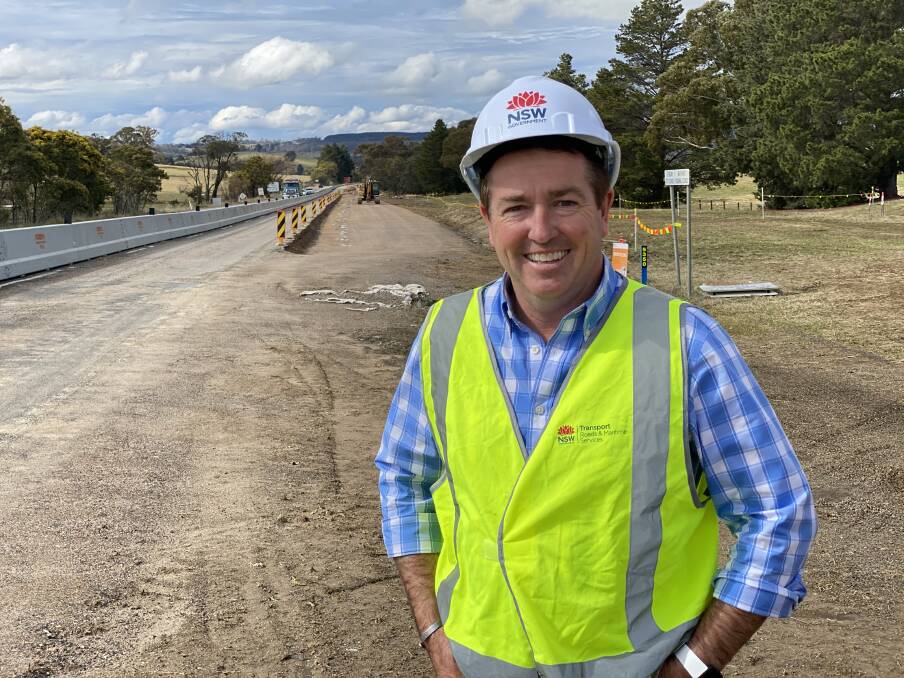 UPGRADE: Member for Bathurst Paul Toole at the
Great Western Highway near Meadow Flat Public school. Photo: SUPPLIED.