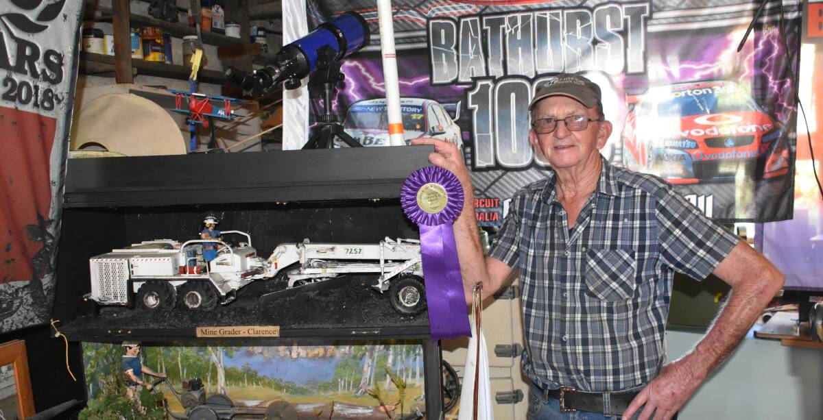 MEET THE MODEL MAKER: John Green has won numerous ribbons for his detailed creation including his Clarence Mine Grader. Picture: ALANNA TOMAZIN.