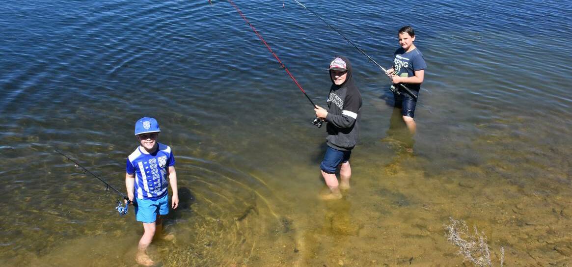 GONE FISHING: Harrison Schroder, Vinnie Porter and Corey Williams at last year's event. Photo: ALANNA TOMAZIN.
