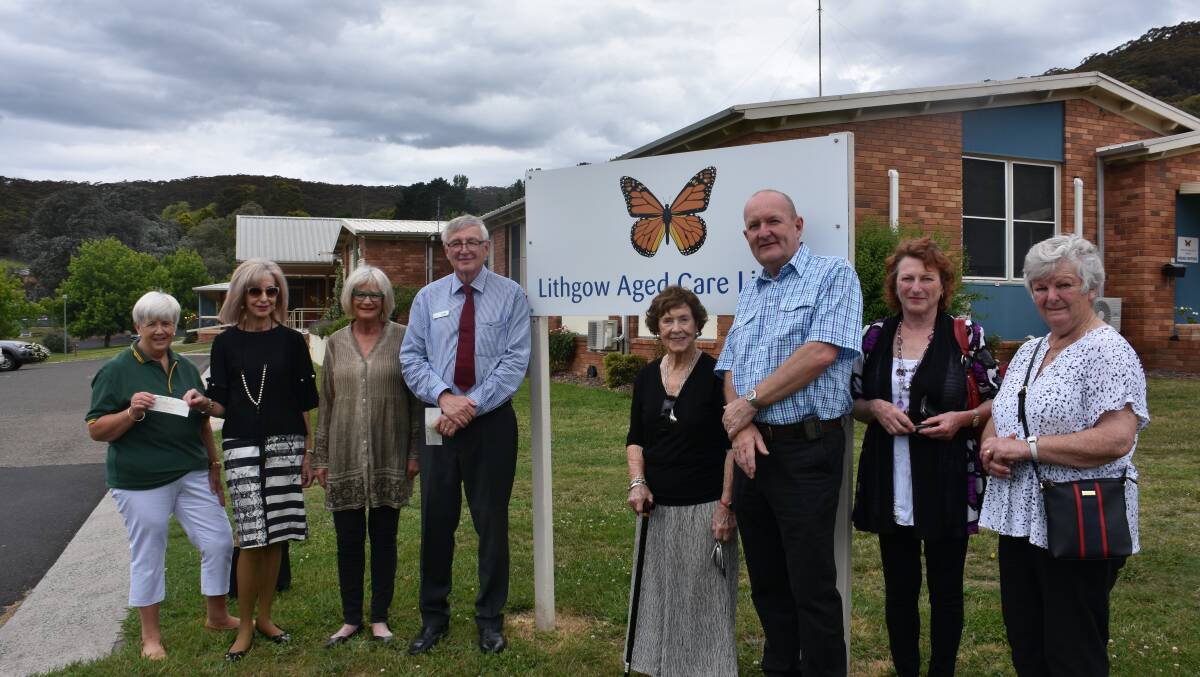 GENEROUS: Marilyn Tulley, Maree Statham, Carolyn Andison, Craig Oeding, Kay Martin, Phil Paton, Judy Finlay and Julie Grant at Cooinda Homes for the handover. Picture: ALANNA TOMAZIN.
