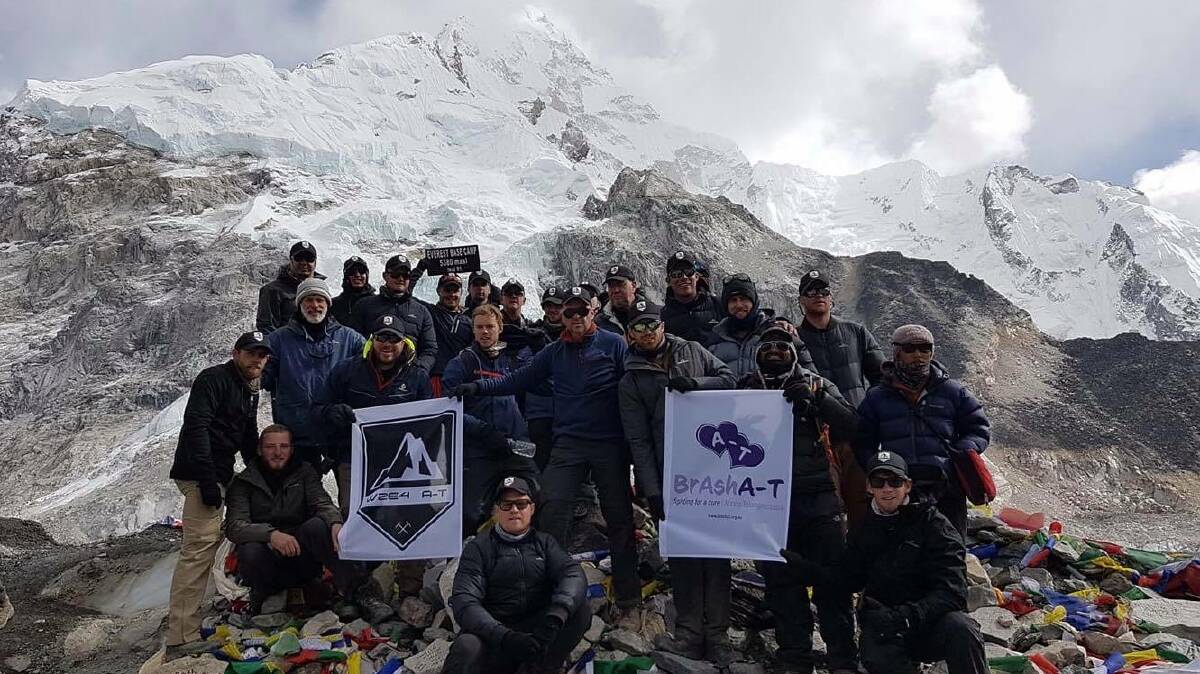 TREKKING FOR A CURE: All 24 friends and family members who trekked up Mount Everest to raise money for A-T research. Photo: SUPPLIED.