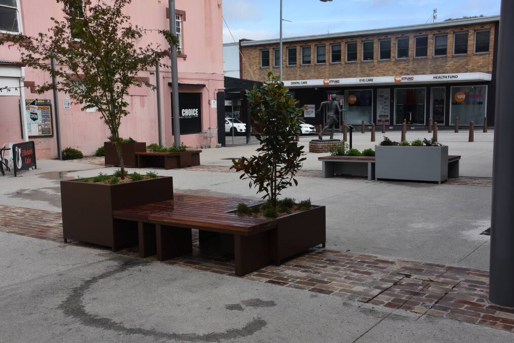 NEW LOOK: Cook Street Plaza gets planter boxes installed. Picture: ALANNA TOMAZIN.