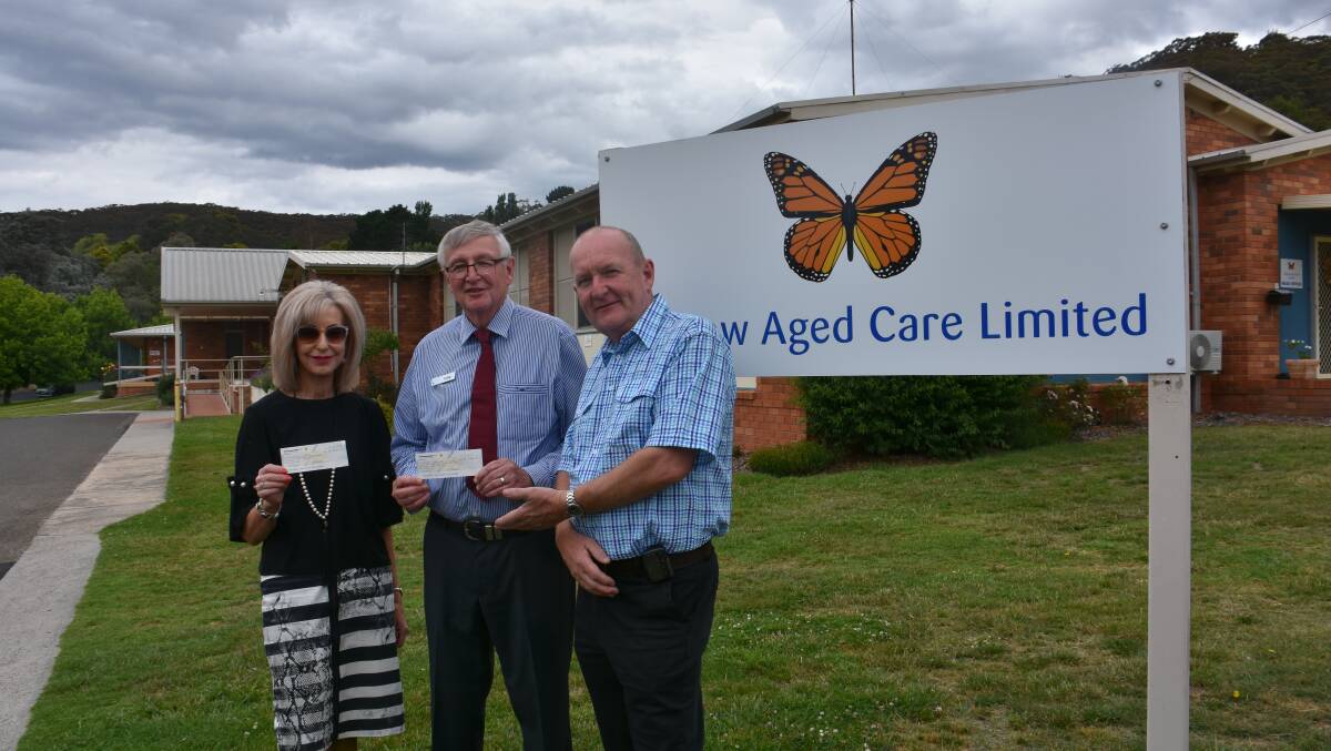 DONATION: Can Assist Lithgow president Maree Statham, Lithgow Aged Care Limited CEO Craig Oeding and Rydal Village Association president Phil Paton. Picture: ALANNA TOMAZIN.