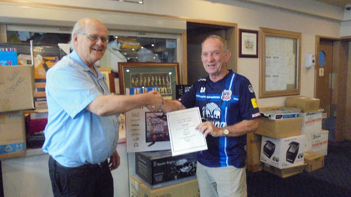 WINNER: Portland RSL's Denis Kelly with prize winner Roy Whitney. Picture: SUPPLIED.