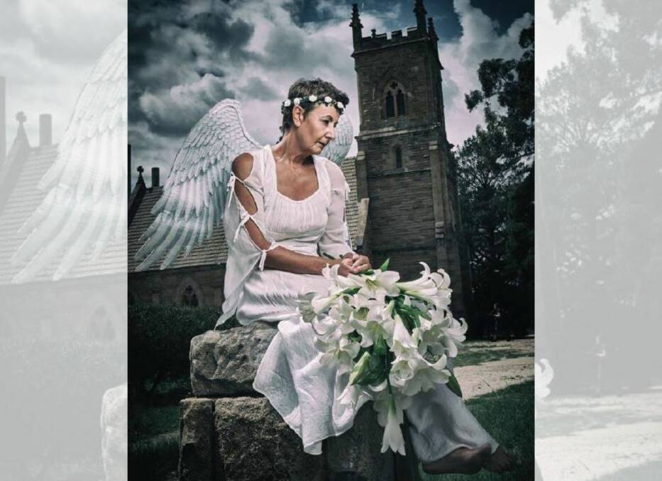 Vicki Hartley posed as a white angel in the 2020 Gothic Ironfest shoot. Picture: Courtesy of Scott Gilbank