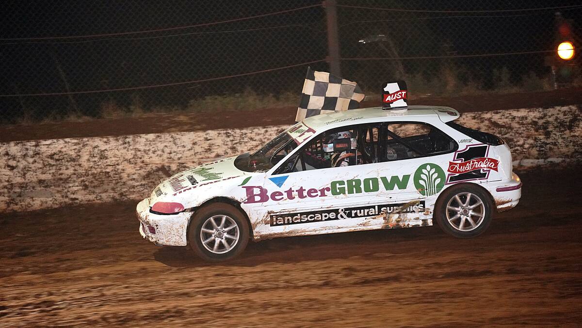 SPEEDWAY ACTION: Healey claims the lead in his Bettergrow sponsored Honda Civic. Photo: Courtesy of Lone Wolf Photography