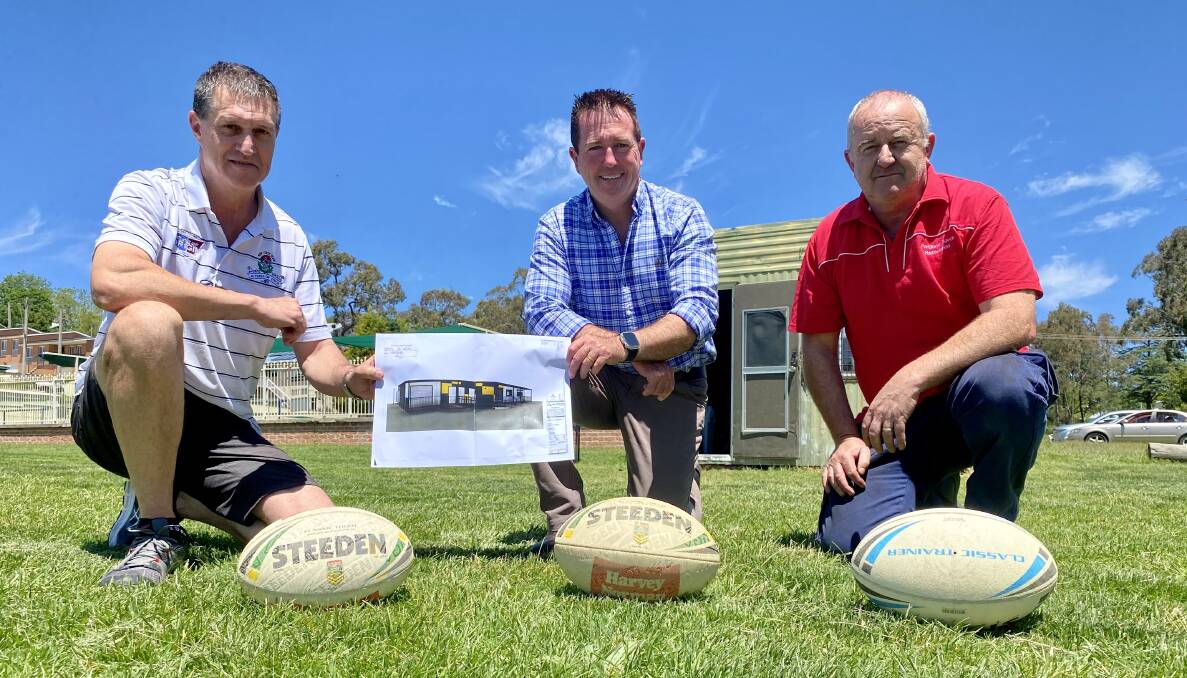 UPGRADE; Portland Touch Footys Eugene Bray, Bathurst MP Paul Toole and president Geoff Stait with an artists impression of the new $500,000 clubhouse to be built at Saville Park. Photo: SUPPLIED.
