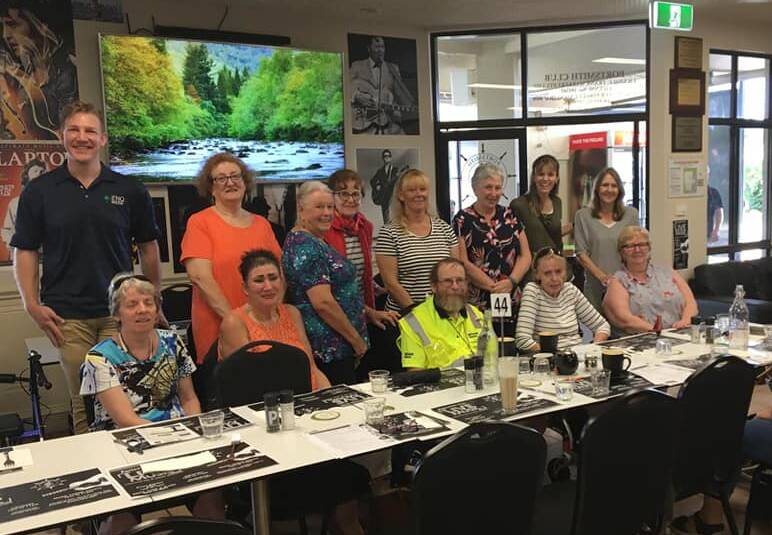 MORNING TEA: The Queensland MS group welcome Greg to Cairns and praise his efforts. Picture: SUPPLIED.