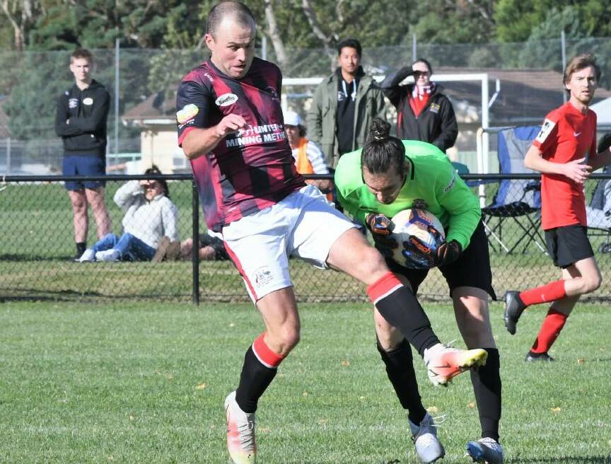 YET TO WIN: Workmen's WPL coach Brad Luka in action at home against Panorama FC. Photo: CHRIS SEABROOK.