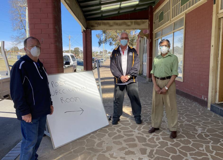 WAITING ROOM: Wallerawang Community and Sports Club CEO Steve Jackson, Cr Joe Smith and Dr Haran outside the post vaccination clinic. Photo: ALANNA TOMAZIN