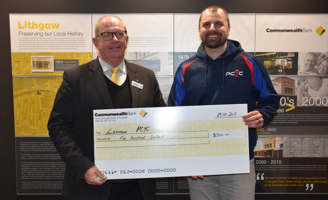 DONATION: Lithgow branch manager Glen Stewart and PCYC club manager Dayne Walker with the $500 cheque. Picture: ALANNA TOMAZIN.