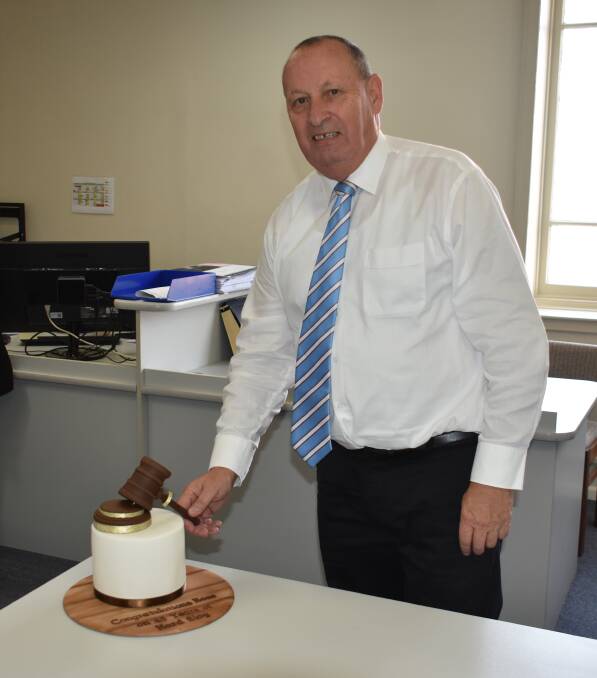 HARD WORK CELEBRATED: Ross Higgins with his celebration cake. Picture: ALANNA TOMAZIN.