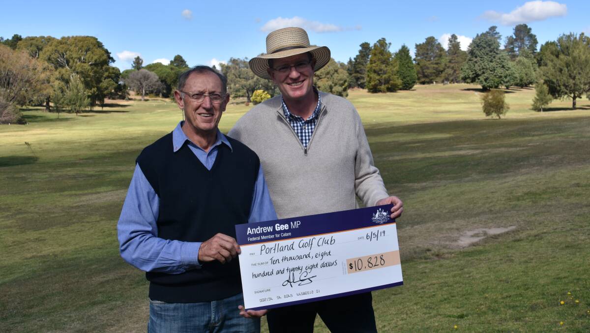 A CHEQUE FOR PORTLAND: Portland Golf Club president with Calare MP Andrew Gee. Picture: ALANNA TOMAZIN.
