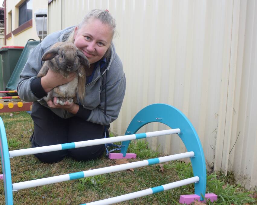BUNNY JUMPER: Rabbit hopping enthusiast Vanessa Allan with her mini lop cross rabbit Snickers. Picture: ALANNA TOMAZIN.