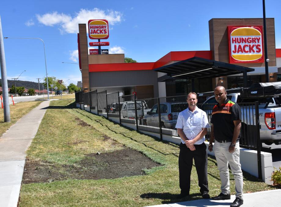 HUNGRY JACK'S:District manager David Wells and regional manager Nitin Mattal. Picture: ALANNA TOMAZIN.