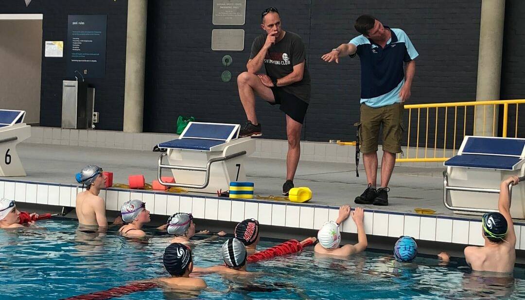 LESSON: The performance squad getting advice from Lithgow Coach Craig McManus and gold medal winning Coach Shannon Rollason. Photo: SUPPLIED