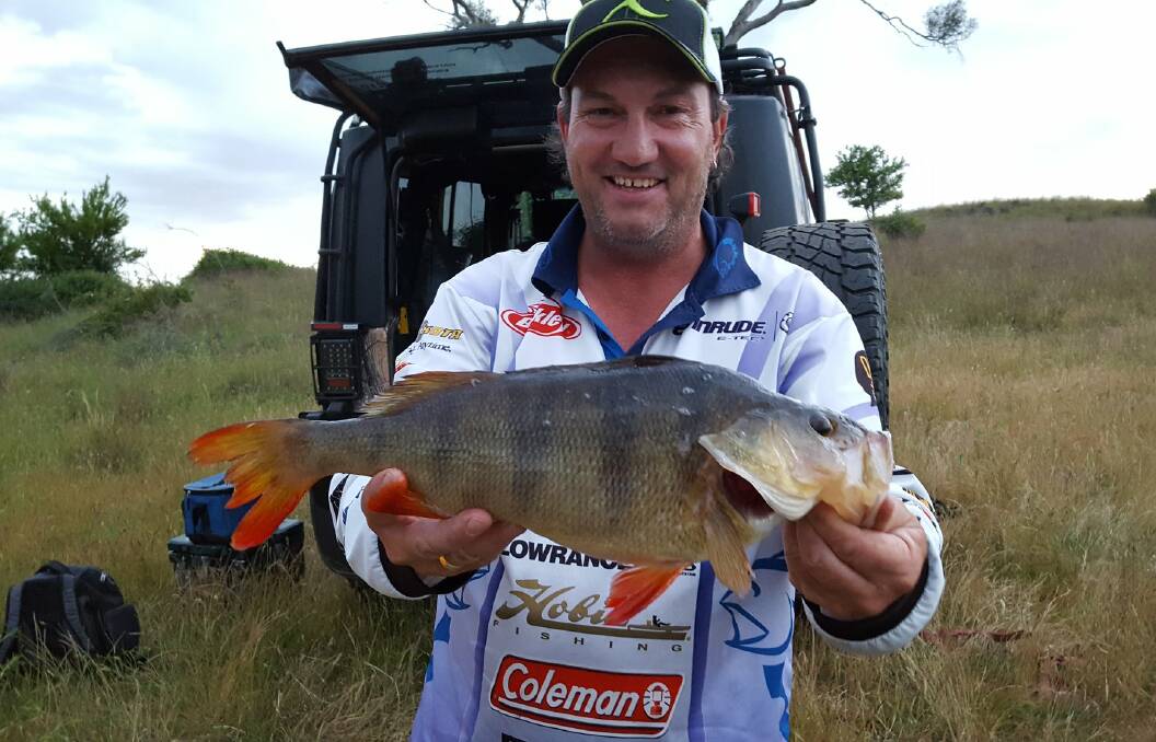 CATCHING PESTS: Owner of The Fishing Factory Orange Ian "Macca" McLean shows off his Redfin catch. Photo: SUPPLIED.