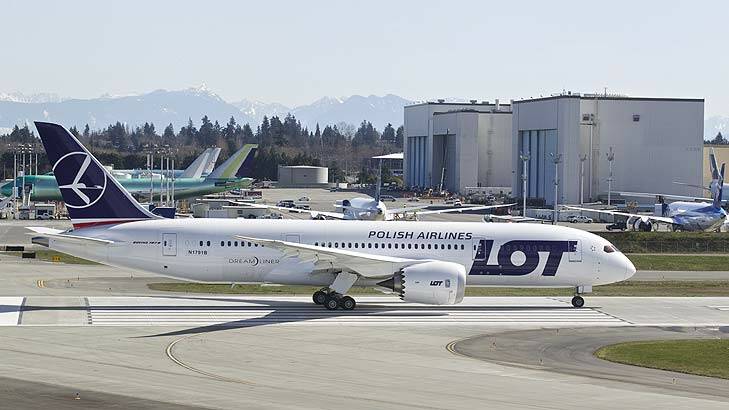 Test flight ... a LOT Polish Airlines Boeing 787 Dreamliner, with a redesigned lithium ion battery, prepares to take off. Photo: Getty Images/AFP