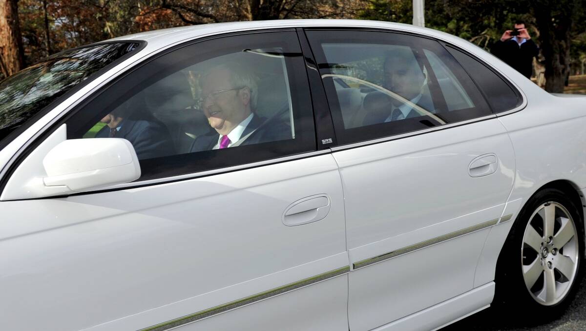 Prime Minister Kevin Rudd arrives at government house to speak with the Governor-General on Sunday, August 4, 2013. Picture: Jay Cronan 
