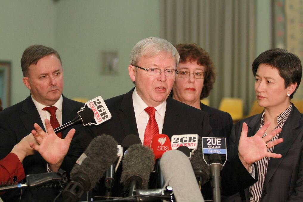 Prime Minister Kevin Rudd with senior cabinet members, held a press conference on July 22, when the Labor party federal caucus gathered in Sydney to change how the party elects it's parliamentary leader. Photo by Cole Bennetts/Getty Images.