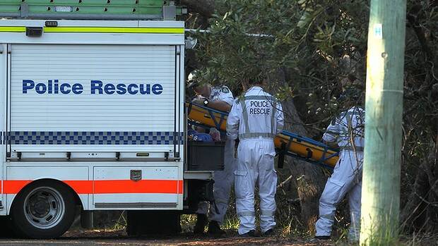 Police rescue crews arrive at the scene in the Blue Mountains where the body was discovered. Photo: Kate Geraghty 